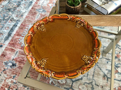 DeForest of California Ceramic Cake Stand — Orange Drip Glaze, 1962, 12.5" diameter - Loom Vintage