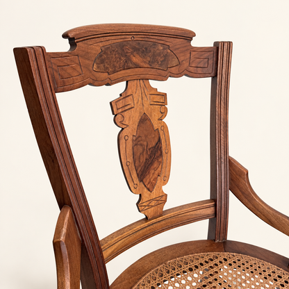 Eastlake walnut side chair with round hand-caned seat, front view