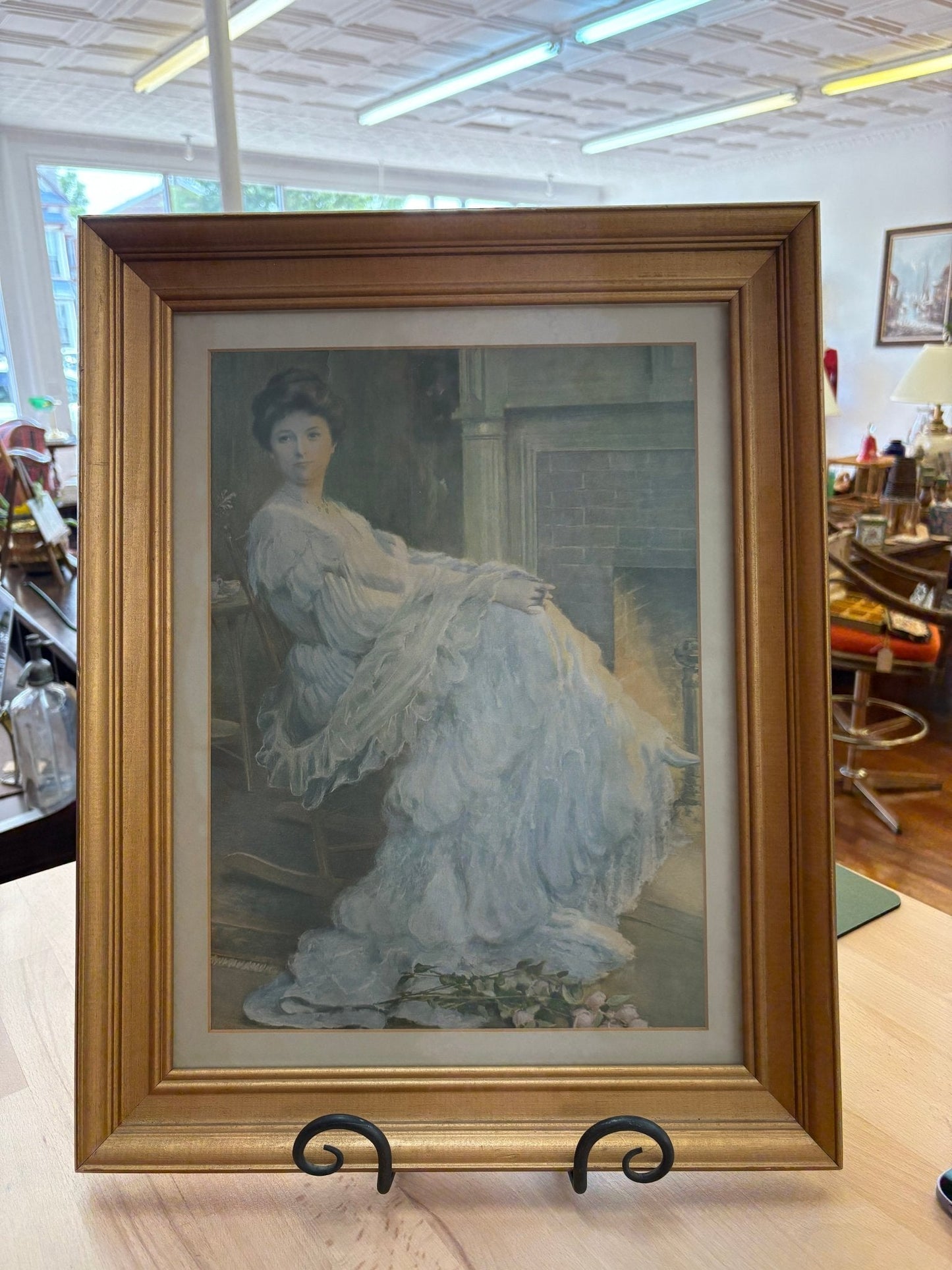 Edwardian Lady by the Hearth – Framed Print in Gilt Wood, 19″ × 15″ - Loom Vintage