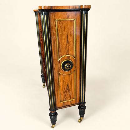 Side view of antique rosewood bookcase with ebonized fluted columns