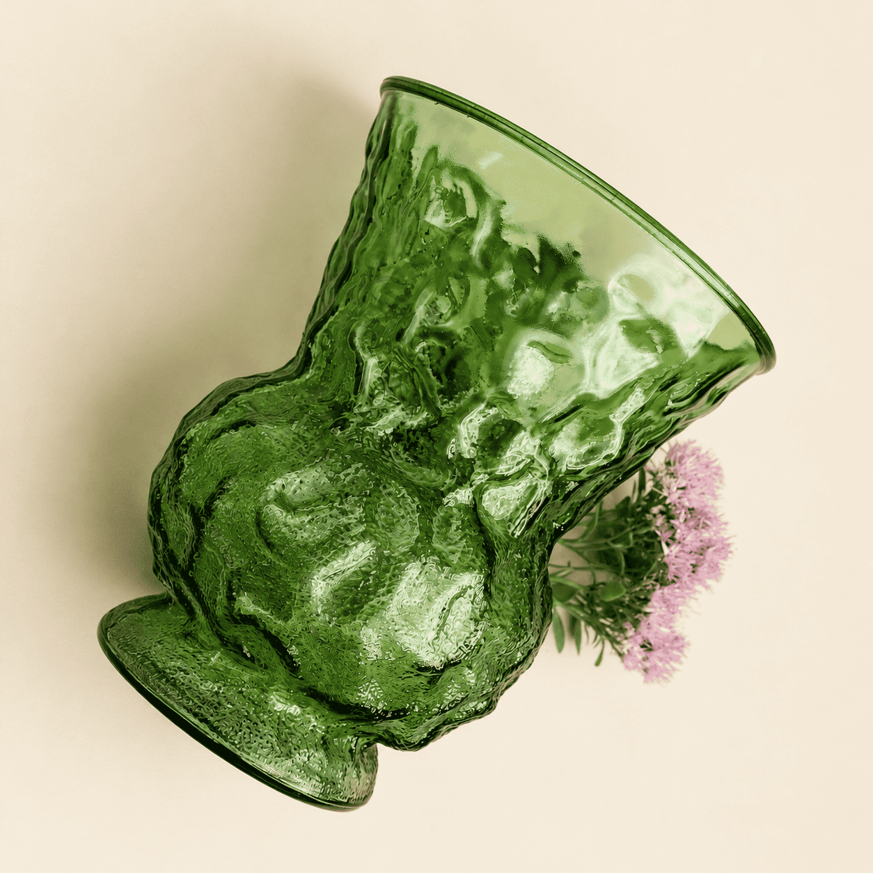 Tipped view of E.O. Brody green crinkle glass vase showing crinkle texture