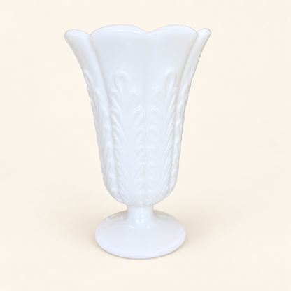 E.O. Brody milk glass footed vase with scalloped rim and embossed plume pattern