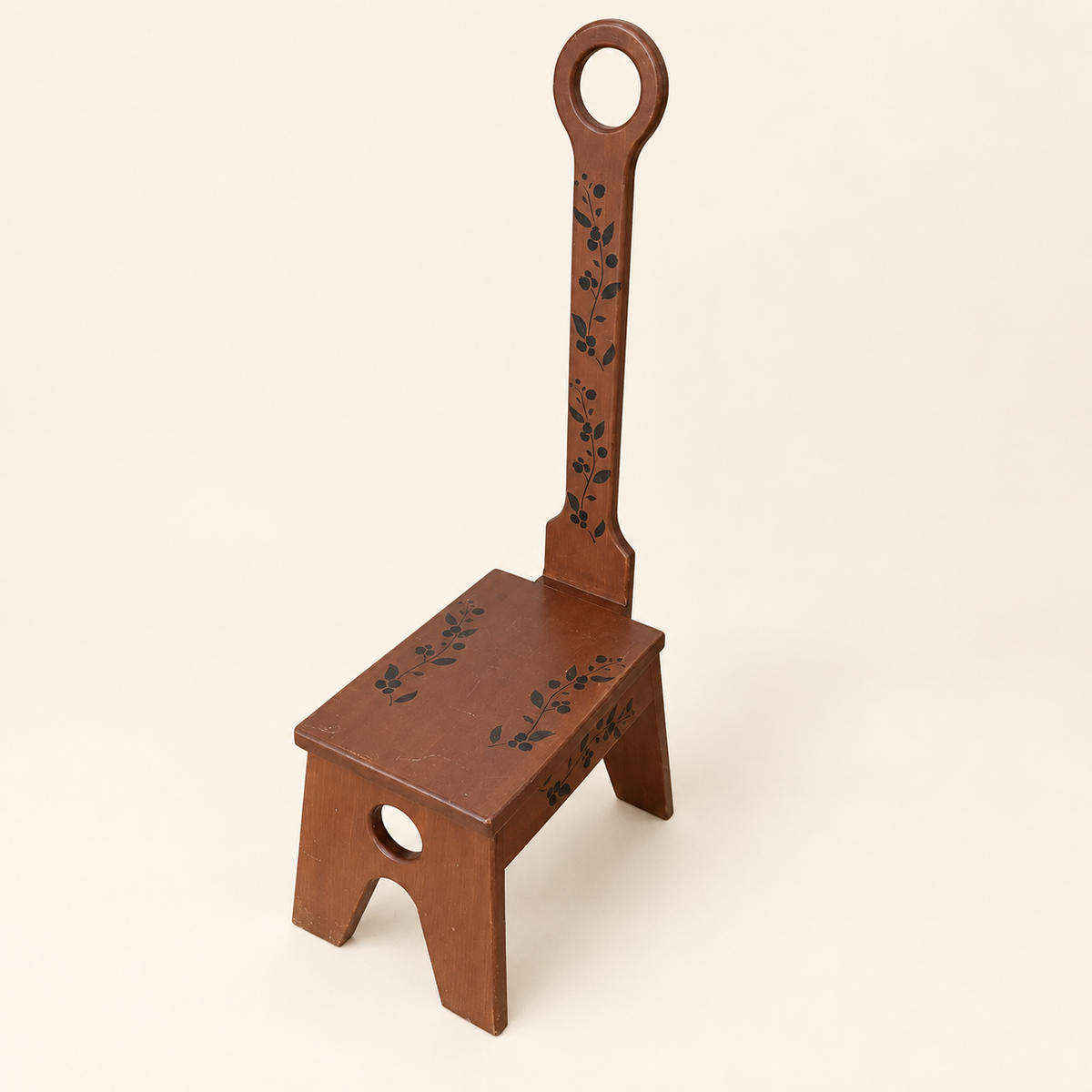 Folk art step stool with tall handle and stenciled blueberry sprigs