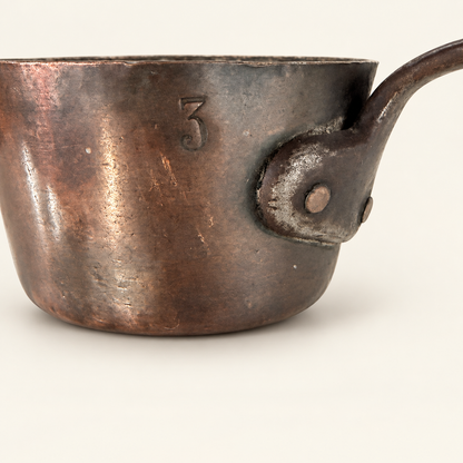 Stamped size 3 on the copper body beside the riveted iron handle