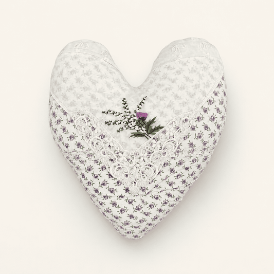 Handmade heart pillow in vintage lilac florals with lace and embroidered thistle, front view