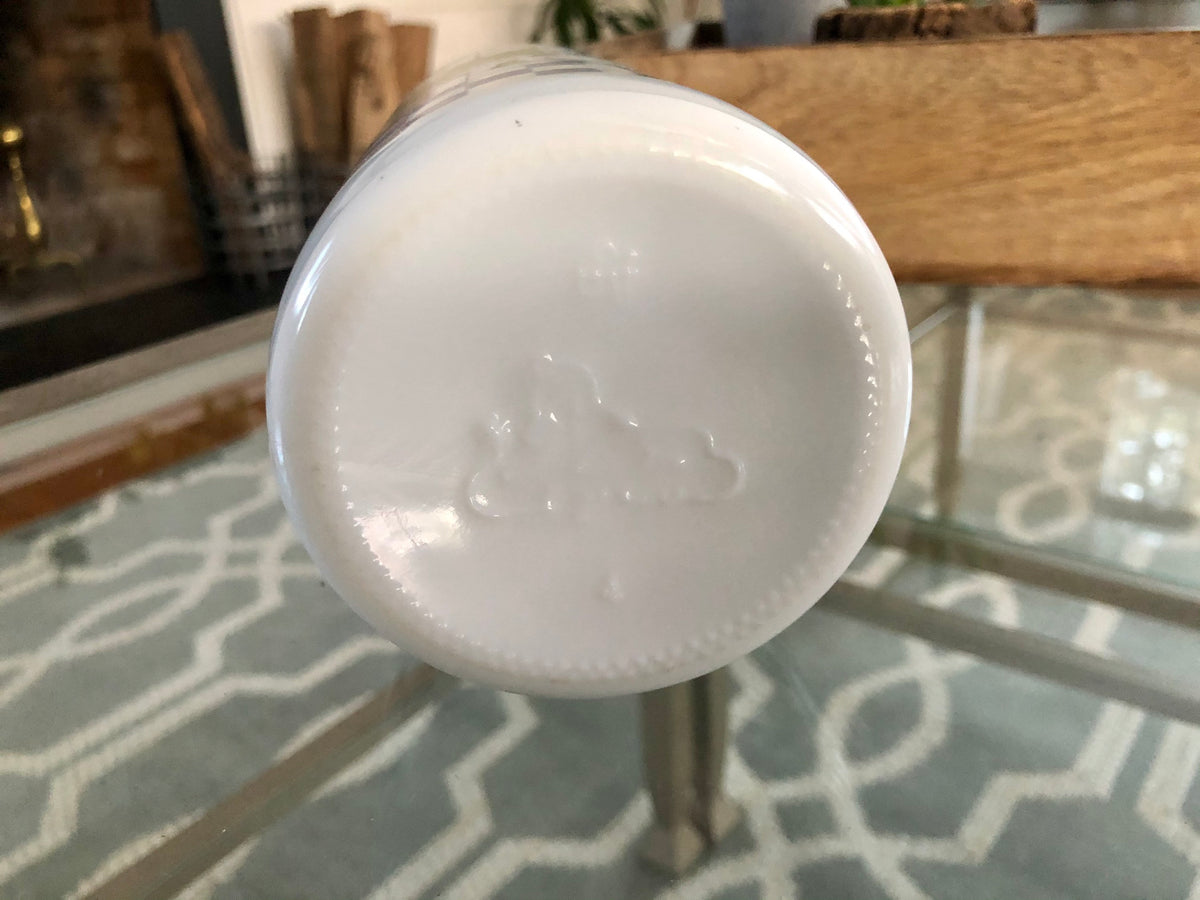 Base of the milk glass bottle with the Egizia maker's mark