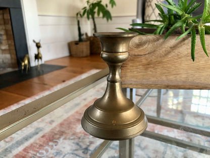 Vintage brass candlestick — turned stem detail