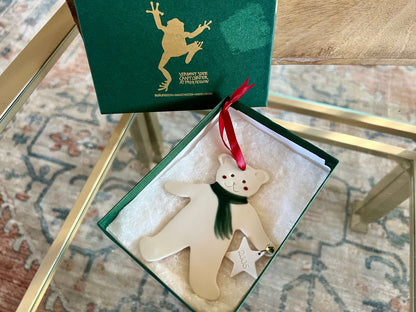 Handmade ceramic Christmas ornament of a bear in a green scarf holding a 2005 star, from Vermont — detail view