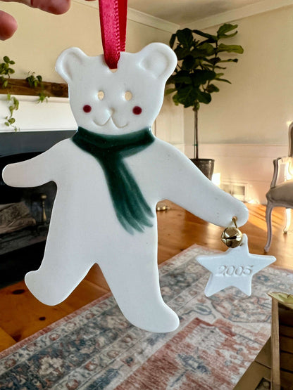 Handmade ceramic Christmas ornament of a bear in a green scarf holding a 2005 star, from Vermont — detail view