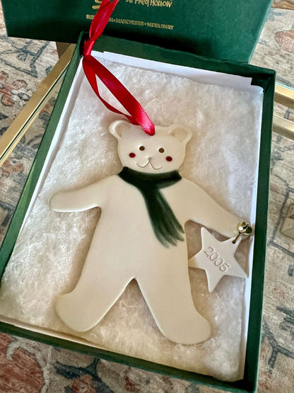 Handmade ceramic Christmas ornament of a bear in a green scarf holding a 2005 star, from Vermont — detail view