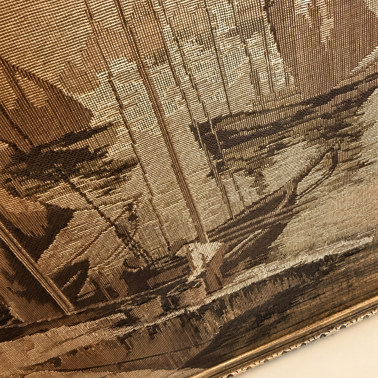 Close-up of the jacquard tapestry weave on the antique La France ship mirror