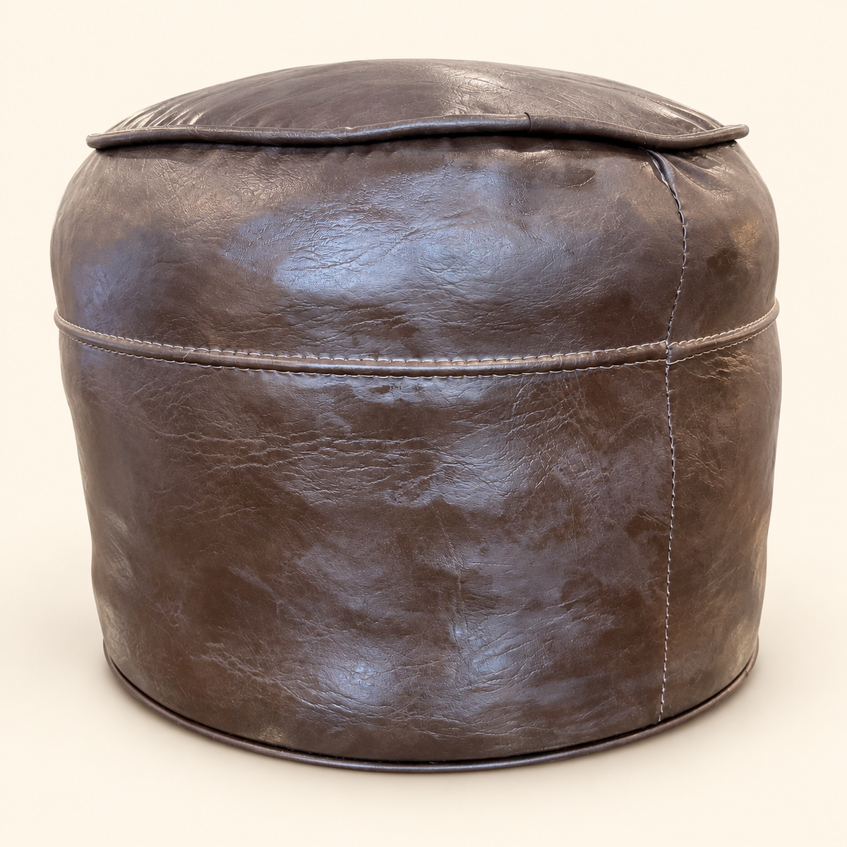 Vintage brown vinyl hassock with stitched seams