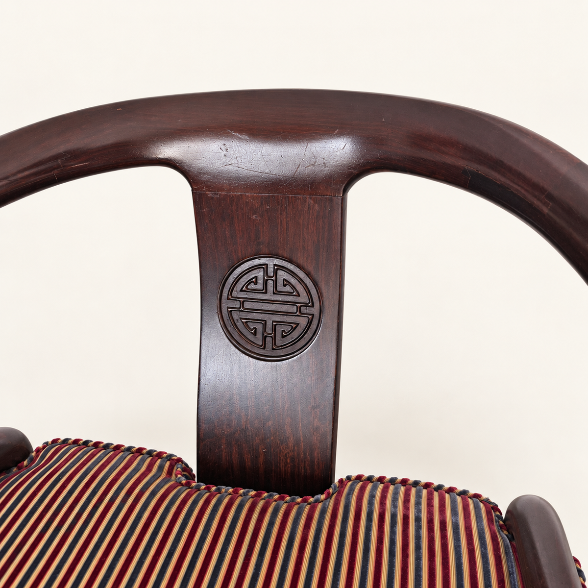 Chinese horseshoe-back lounge chair, three-quarter view