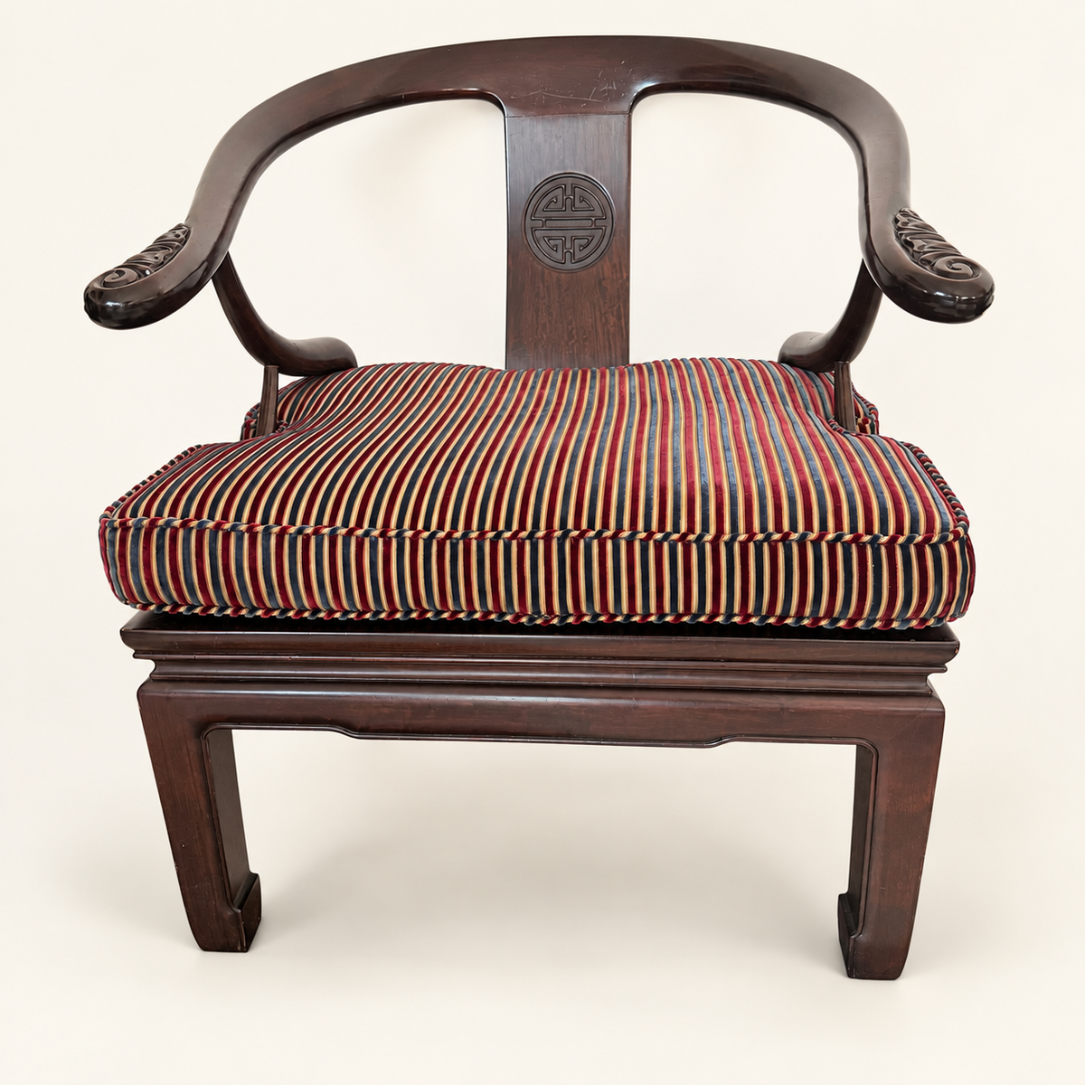Curved horseshoe back and arms of a Chinese lounge chair
