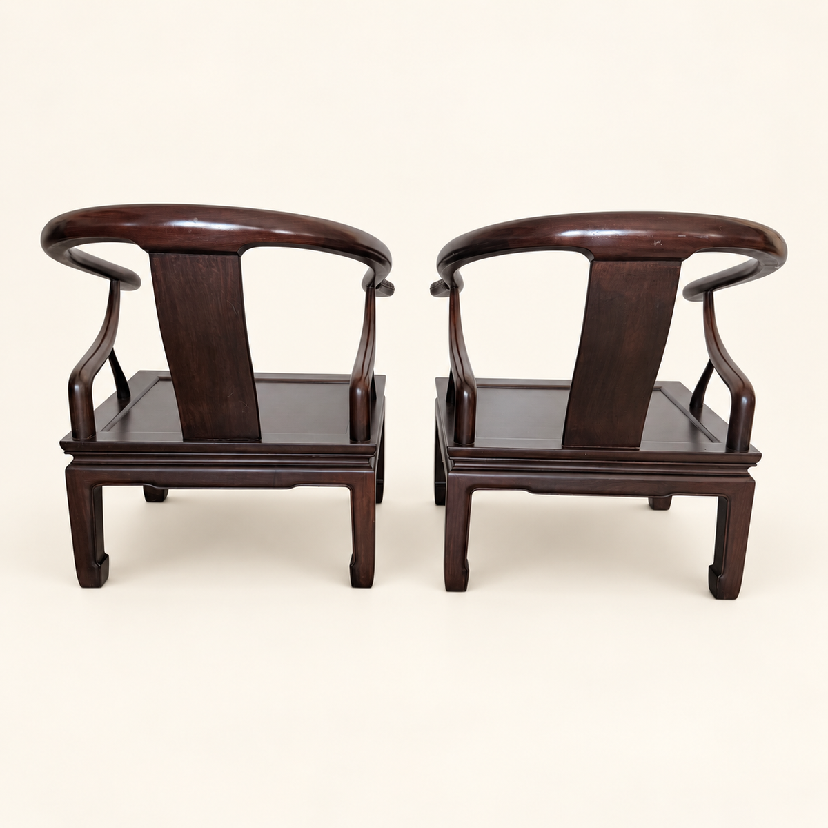 Pair of Ming-style Chinese lounge chairs styled together
