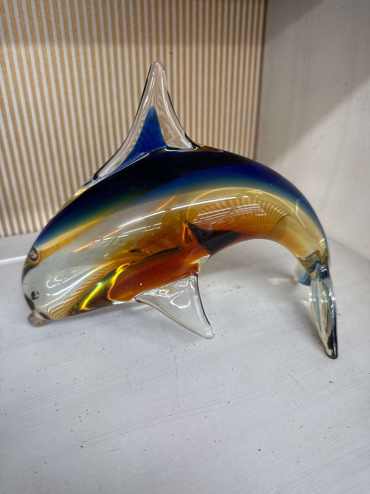 Murano style glass dolphin side view with clear pulled fins and tail