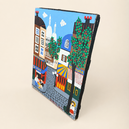 Angled view of signed naïve folk art Paris painting