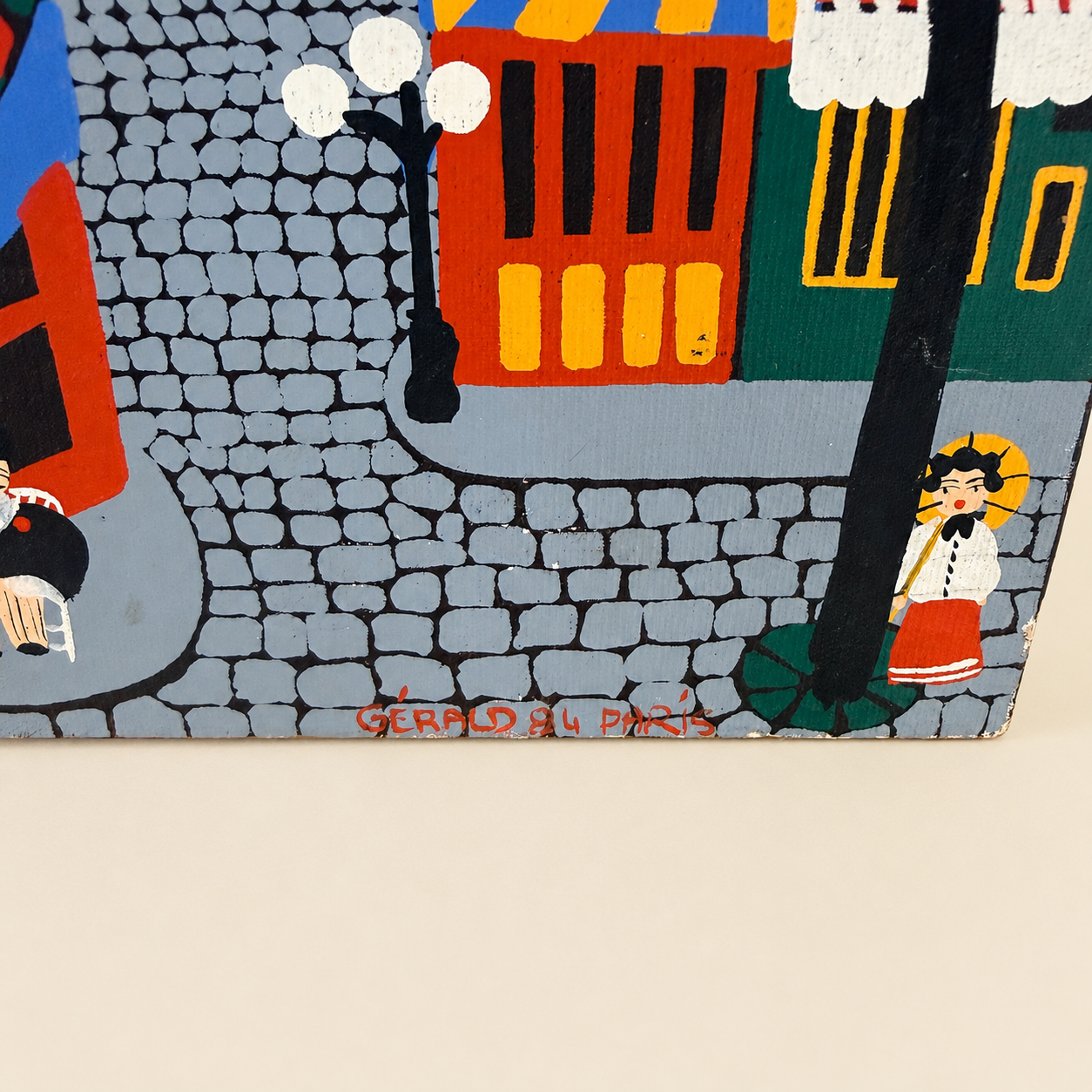 Back of canvas board painting showing sawtooth hanger