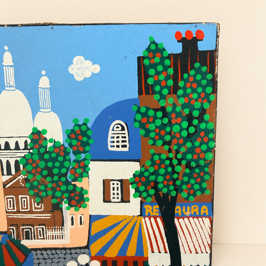 Detail of orange trees and chimney pots in naïve Paris street painting