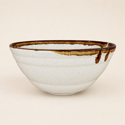 Side view of large Pfaltzgraff brown drip mixing bowl