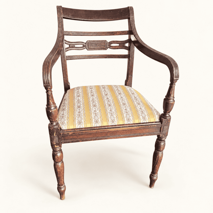 Regency-style mahogany carver armchair, front view with gold floral drop-in seat
