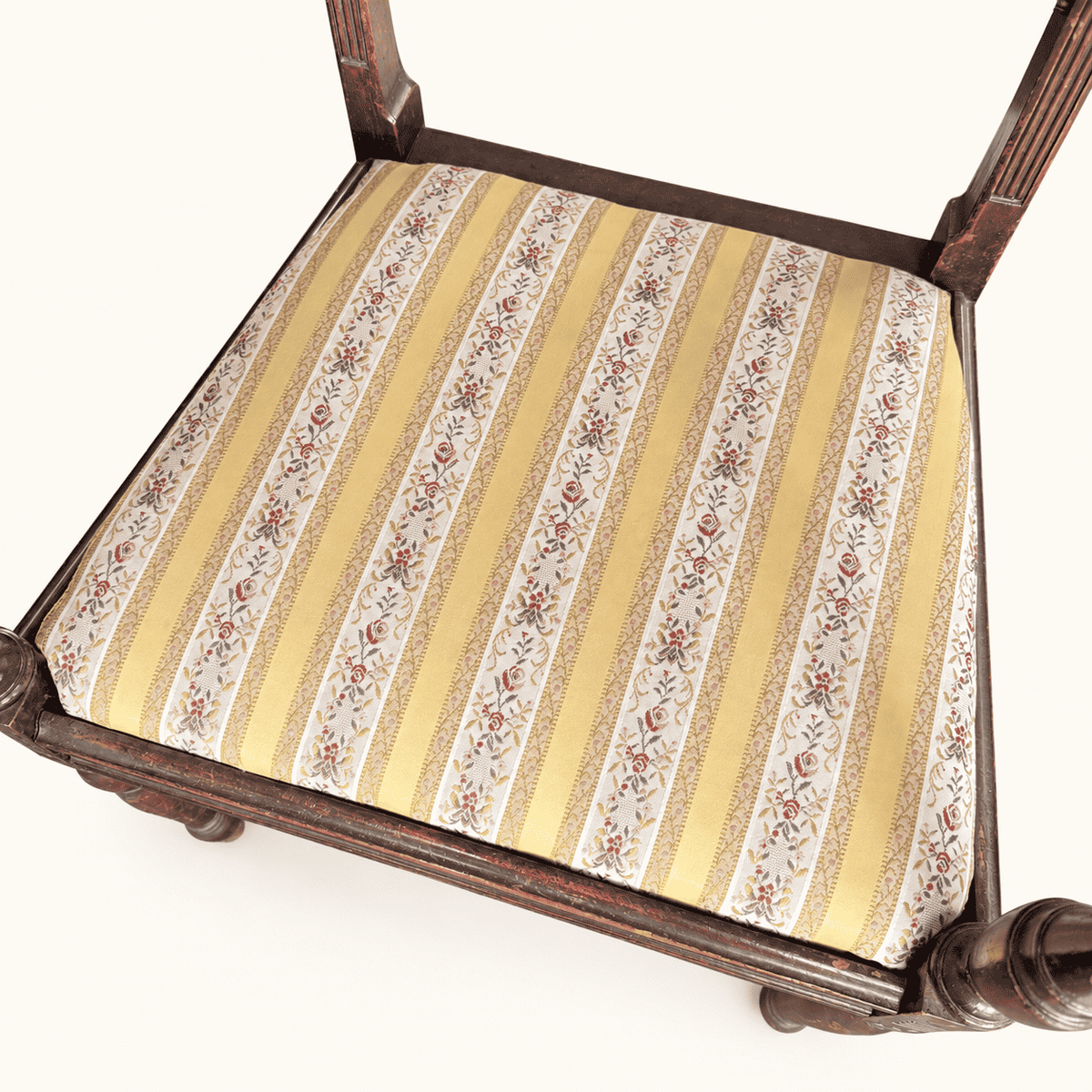 Gold floral-stripe drop-in seat seen from above