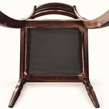 Underside of the seat with black cambric and the mahogany frame
