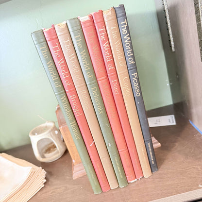 Time-Life Library of Art books lined up on a shelf in olive green, coral, tan and charcoal, photo 1 of 2