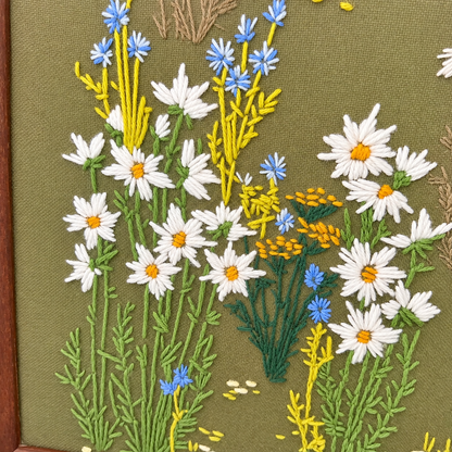 Detail of daisies with yellow centers, cornflowers and mustard tansy in wool crewel, photo 4 of 5