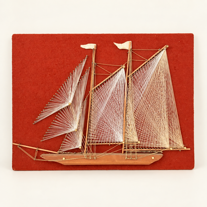 Vintage 1970s string art schooner sailboat on red felt board, front view, photo 1 of 5