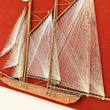 Close-up of string art sails, wood masts and felt pennants, photo 3 of 5