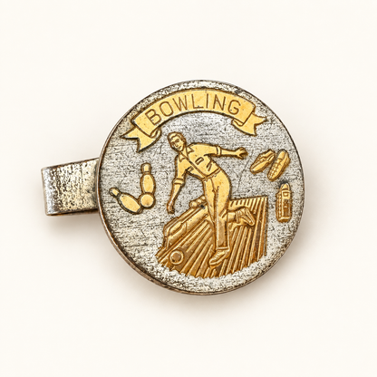 Vintage figural bowling money clip with bowler medallion
