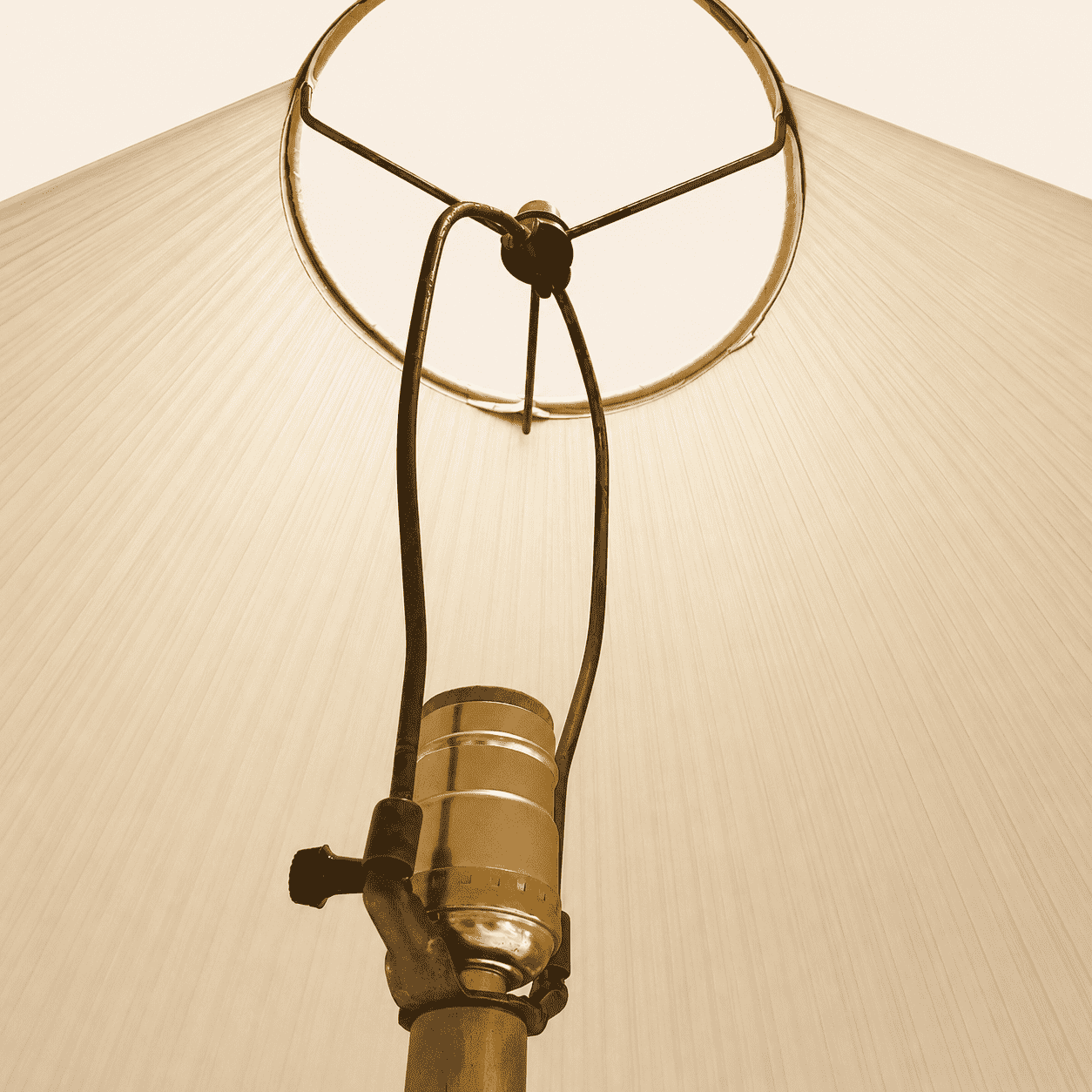 Detail of the sculptural twisted brass column and base