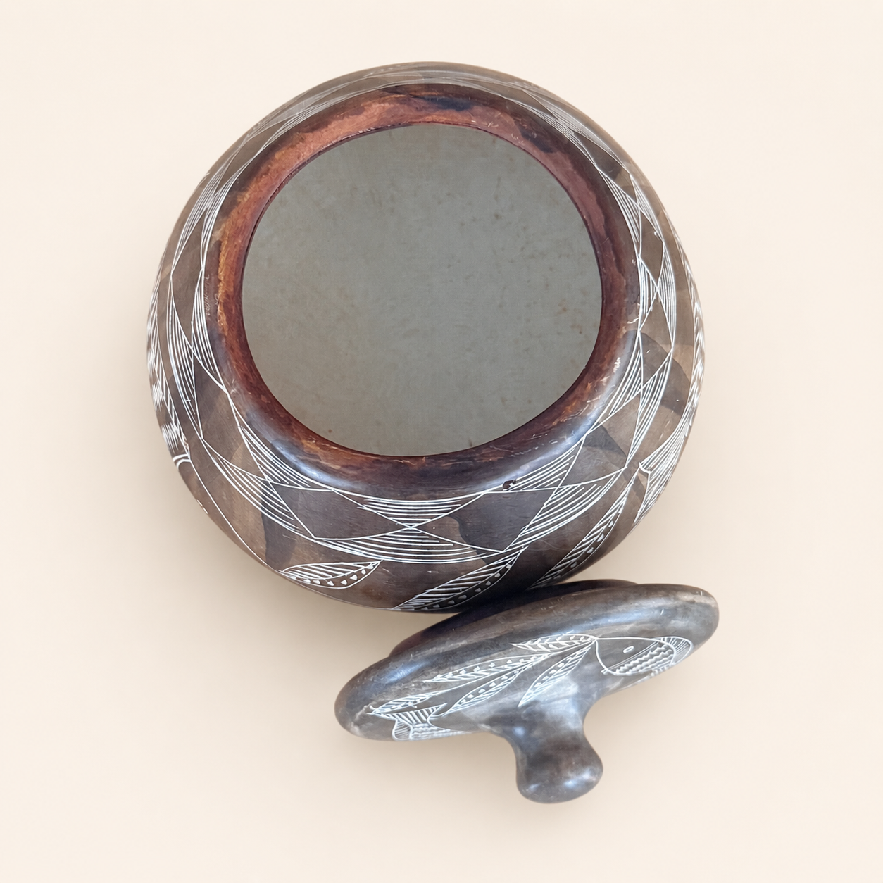 Interior of hollowed soapstone lidded jar