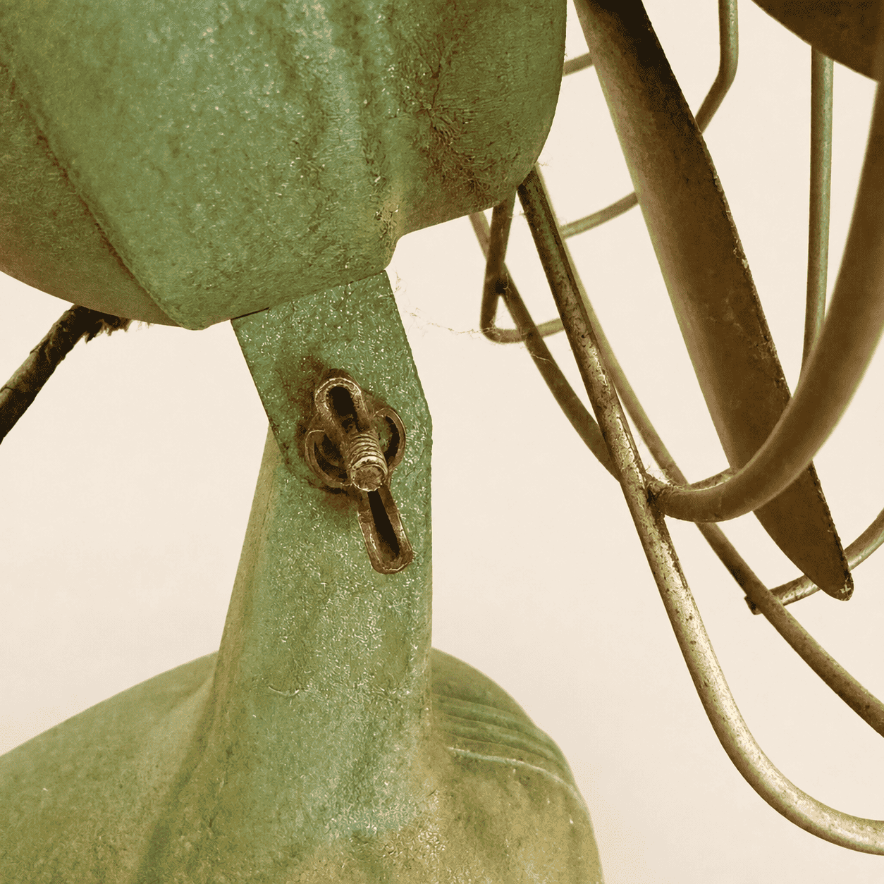 Base and control knob of the vintage Faultless green desk fan