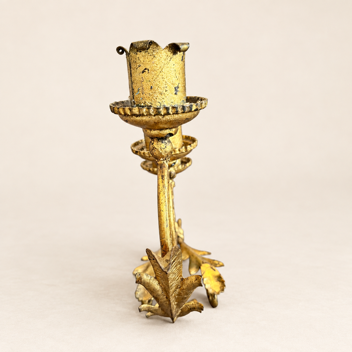 Single candle cup and petal bobèche on a gilt candelabra, detail