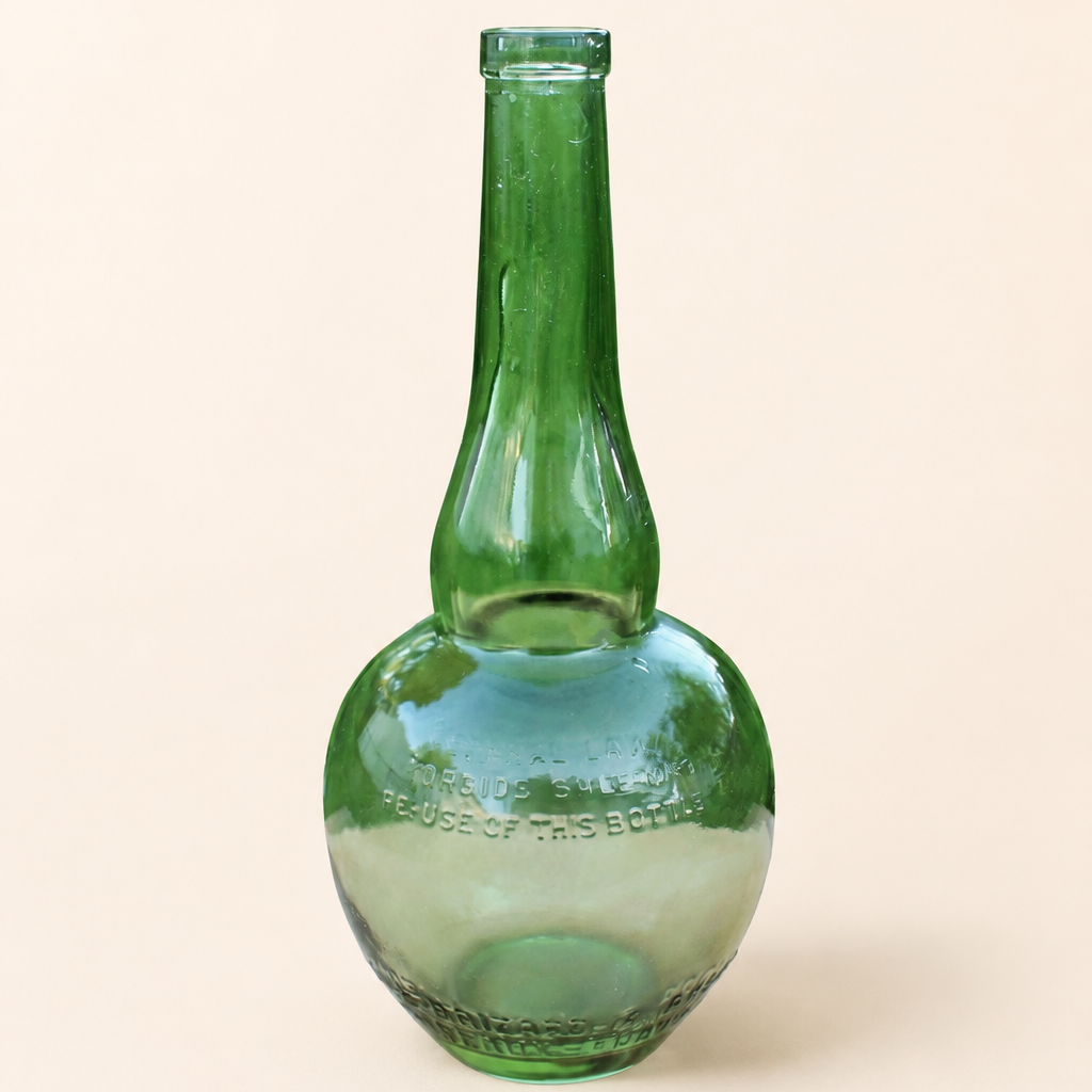 Vintage Marie Brizard green glass liquor bottle, front view