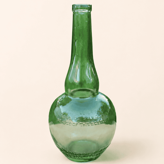 Vintage Marie Brizard green glass liquor bottle, front view