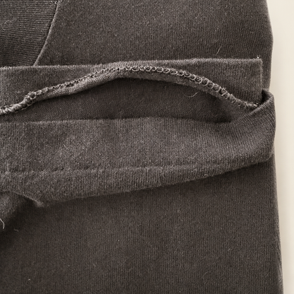 Close-up of small loose bottom hem seam on vintage 1996 Neil Diamond tour tee, disclosed flaw
