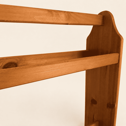 Detail of a rail joint and cut-out foot on the pine quilt rack