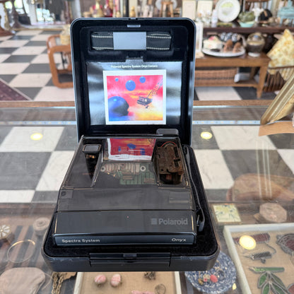 Vintage 1987 Polaroid Spectra Onyx transparent camera with hard case, photo 1 of 7