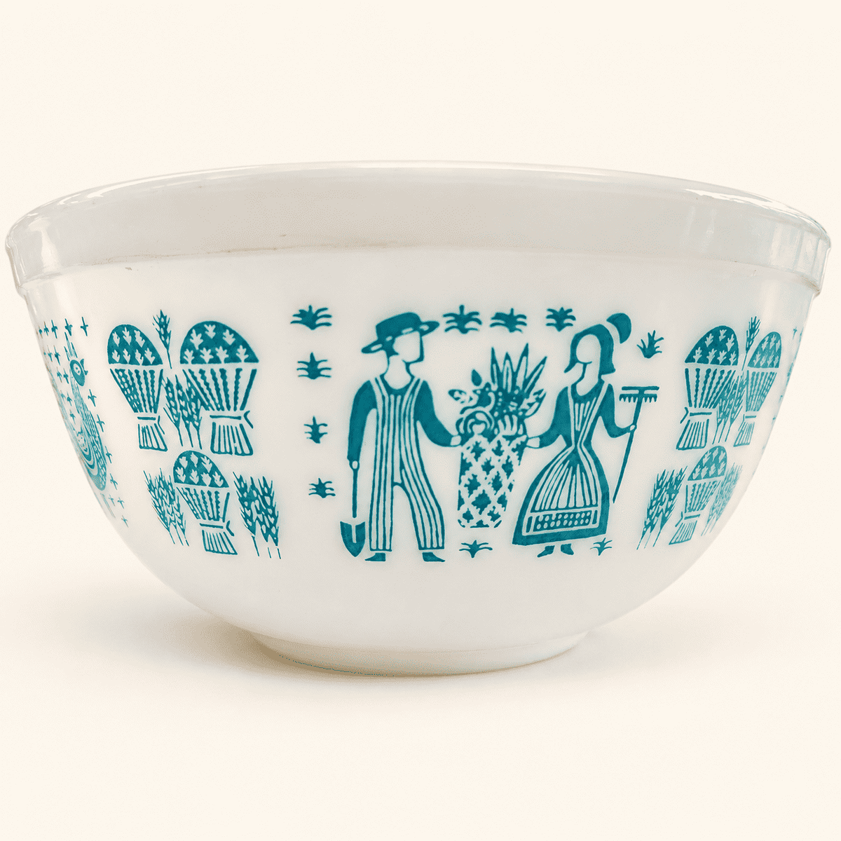 Vintage Pyrex 403 turquoise Amish Butterprint mixing bowl showing the farm couple and wheat sheaves