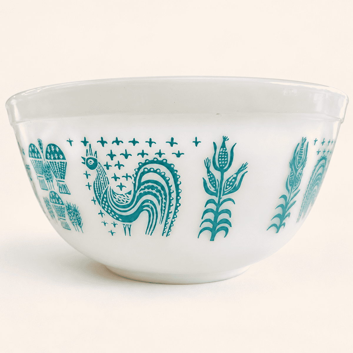 Pyrex Amish Butterprint bowl showing the turquoise rooster and corn stalks