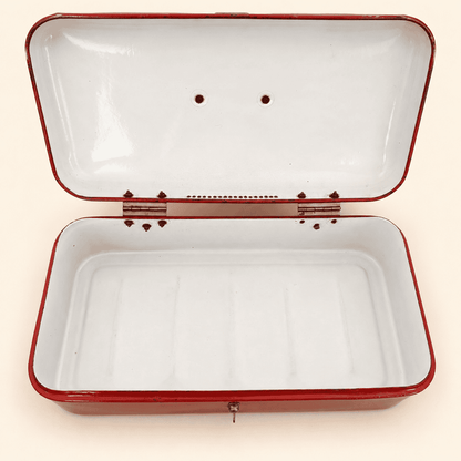 Interior of the lid showing hinge, latch catch, and mounting holes