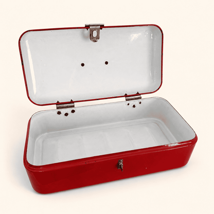 Top-down view into the open red bread box showing white interior