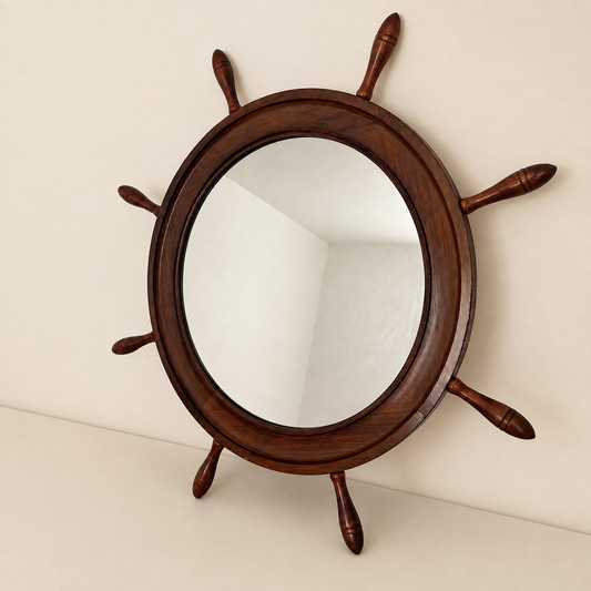 Angled view of the wood ship's wheel mirror on a wall