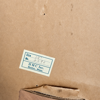 Close-up of the HMC Inc. Boston maker's label on the back