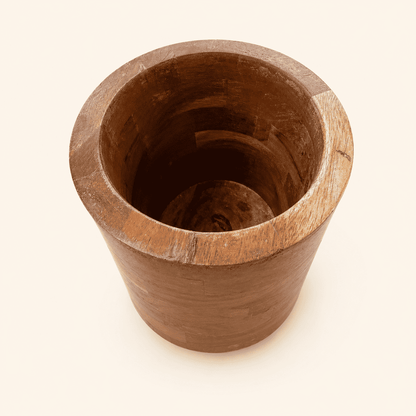 Top-down view into vintage walnut wine chiller showing hollow staved interior