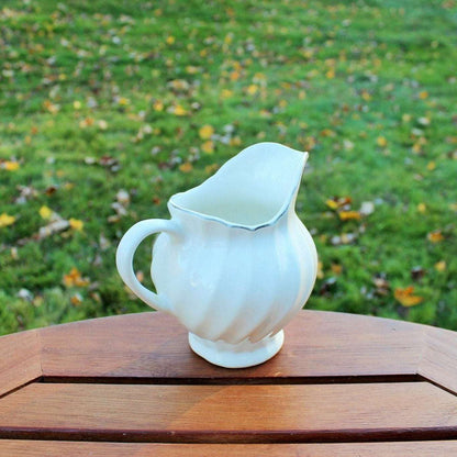 Vintage white ceramic swirl creamer with silver trim, photo 10 of 10