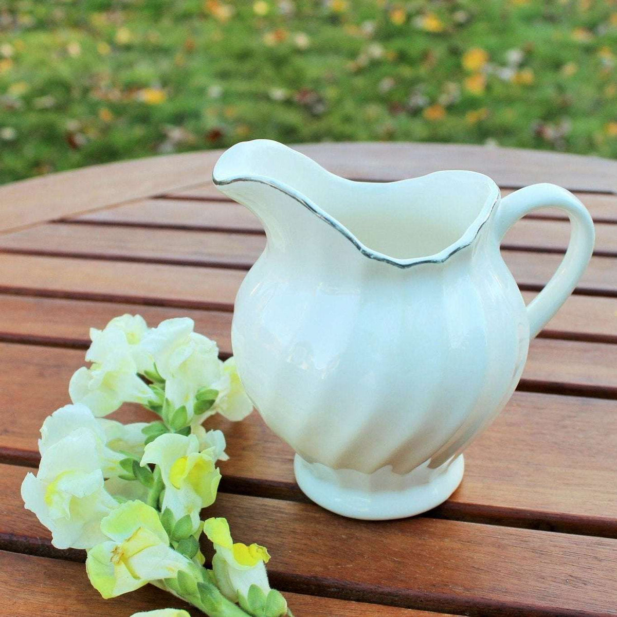 Vintage white ceramic swirl creamer with silver trim, photo 3 of 10